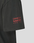 Close-up of the sleeve on a black World Tour T shirt with a red Oracle Red Bull Racing logo.