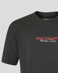 Close-up of the front chest print on a black World Tour T shirt reading Oracle Red Bull Racing World Tour.