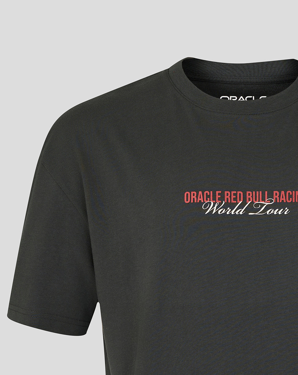 Close-up of the front chest print on a black World Tour T shirt reading Oracle Red Bull Racing World Tour.