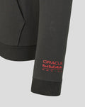 Close up of black hoodie sleeve with red Oracle Red Bull Racing logo near the cuff