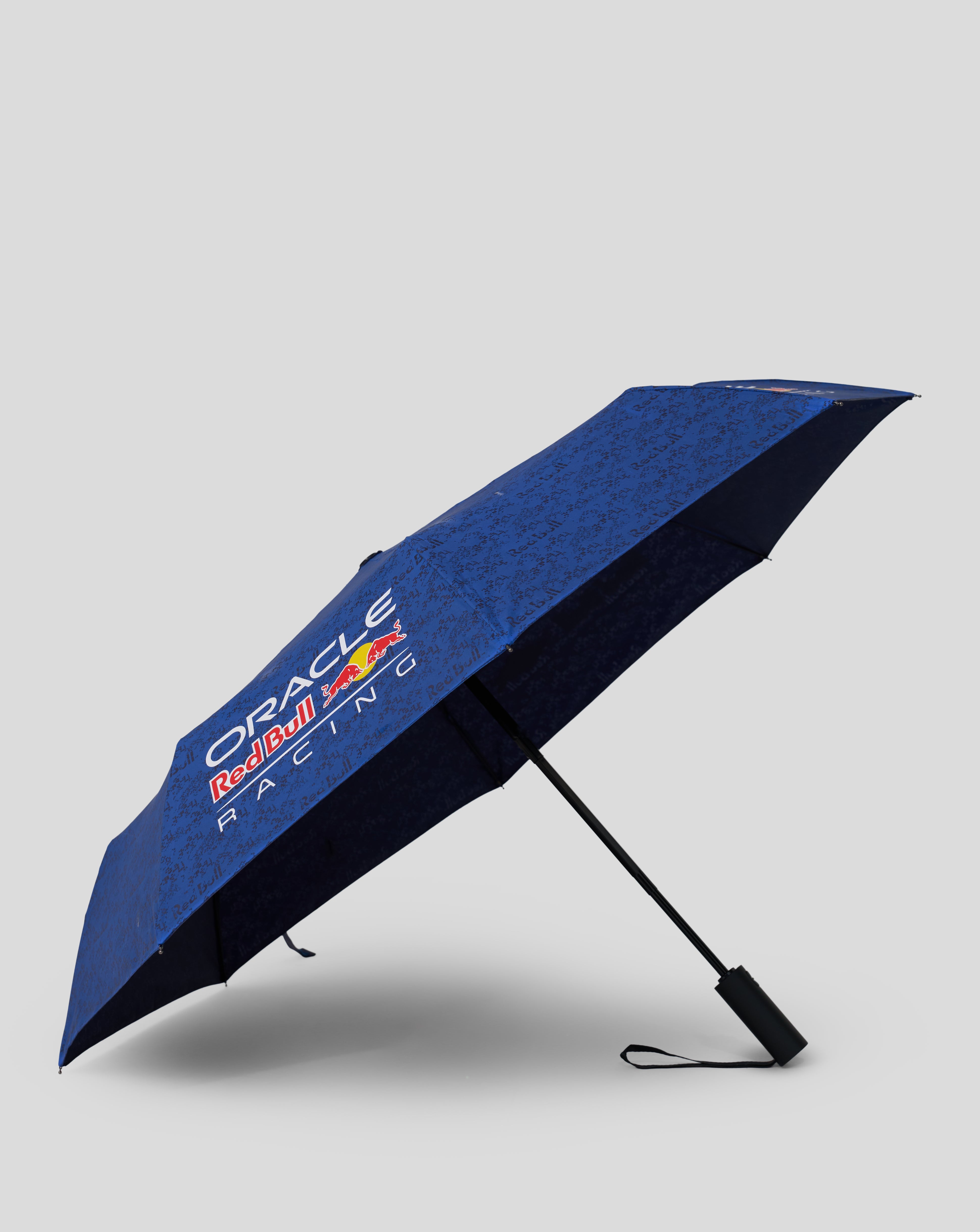 Blue Oracle Red Bull Racing umbrella canopy with a repeating logo pattern and Red Bull emblem