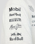 Close up of the sleeve showing Mobil Hard Rock Pirelli Maui Jim and Red Bull logos on a light heather T shirt