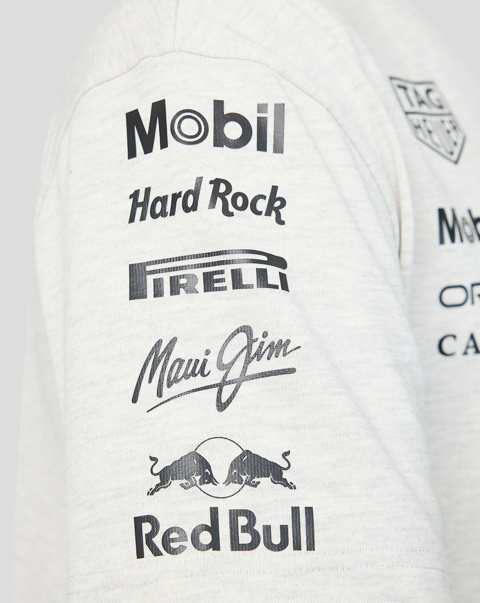 Close up of the sleeve showing Mobil Hard Rock Pirelli Maui Jim and Red Bull logos on a light heather T shirt