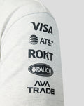 Sleeve of off white marl T shirt with vertical sponsor logos Visa AT&T ROKT Rauch and AVATRADE