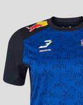 Close up of the blue patterned Red Bull Racing T shirt showing the Verstappen 3 logo on the chest and race style graphics.